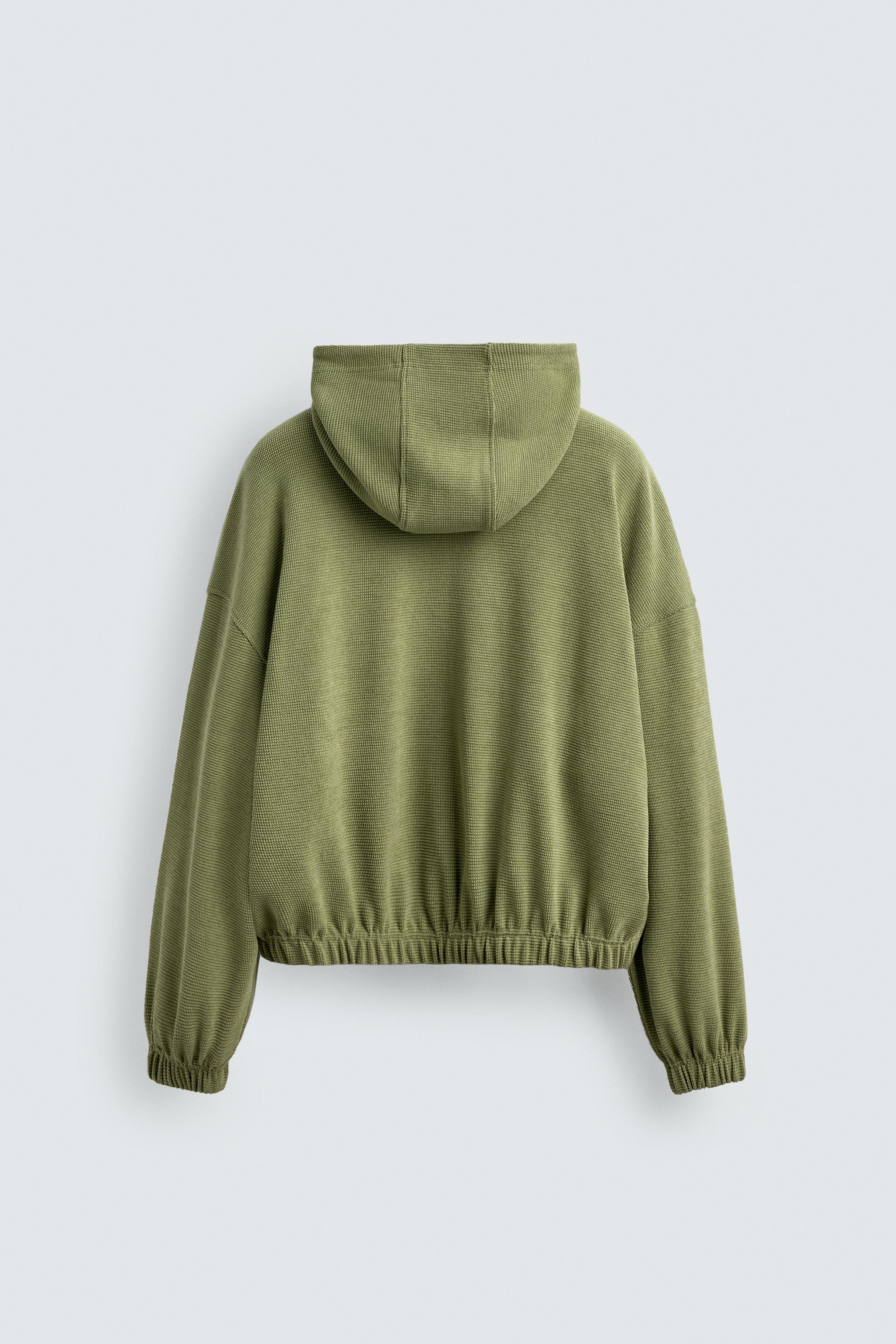BLOUSON WAFFLE DÉLAVÉ À CAPUCHE